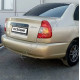 Бампер задний в цвет кузова Hyundai Accent (1999-2012)